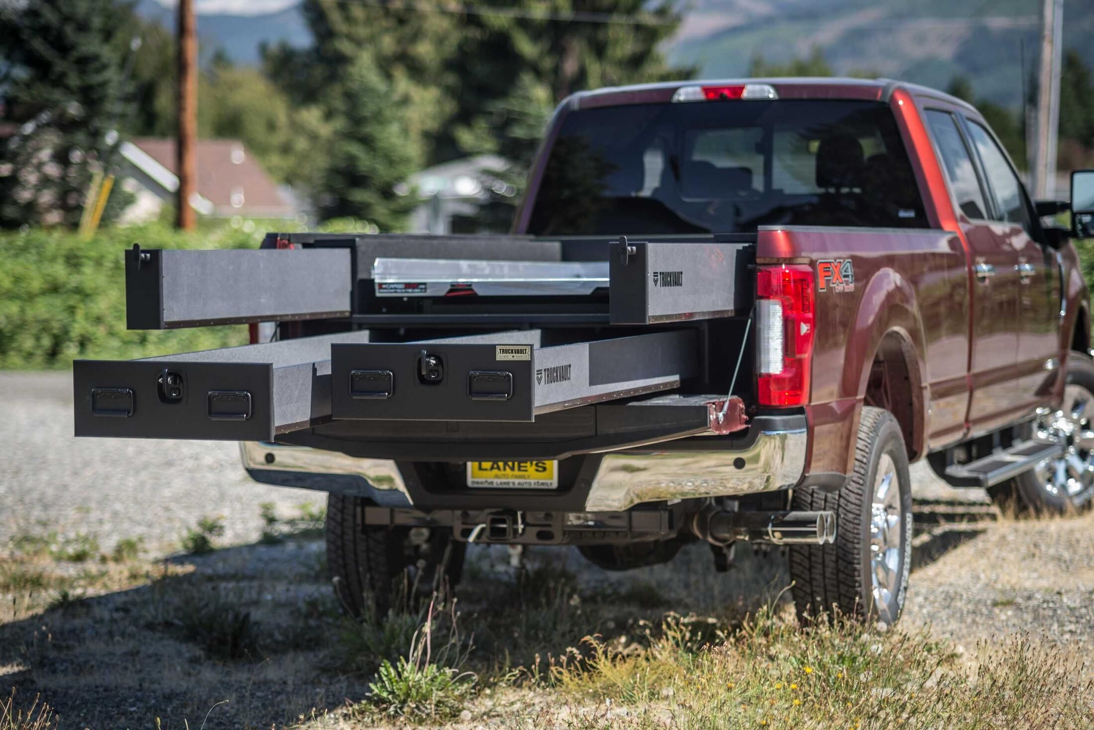 A Ford F250 with a custom 2 drawer TruckVault used for everyday gun storage.