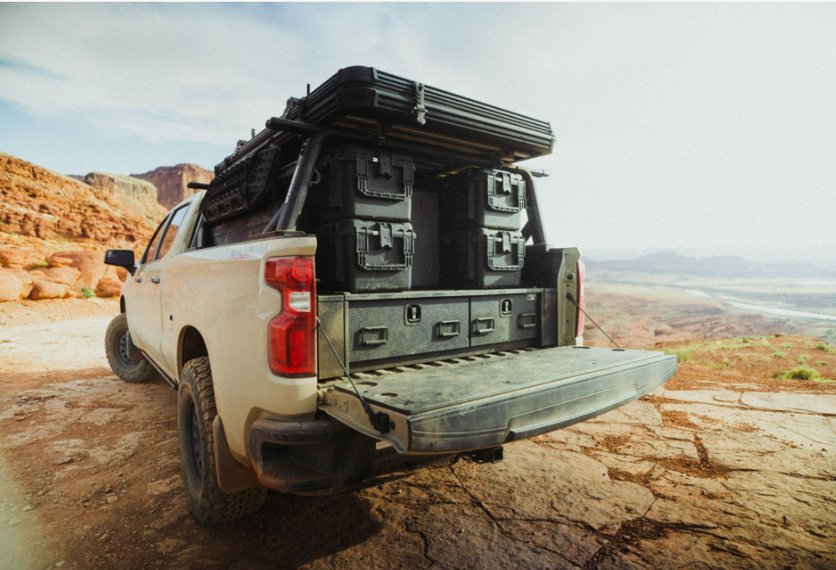 2023 Chevrolet Silverado 1500 All-Weather Offset TruckVault Drawers Rear Angled View with boxes stacked on top of the vault.