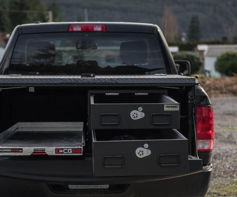 pickup truck with half width drawers stacked on passenger side and cargo glide on driver side