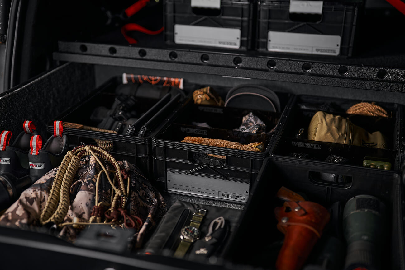 Open TruckVault drawer system showcases SIDIO Crates organizing gear both inside and on top of the drawer system