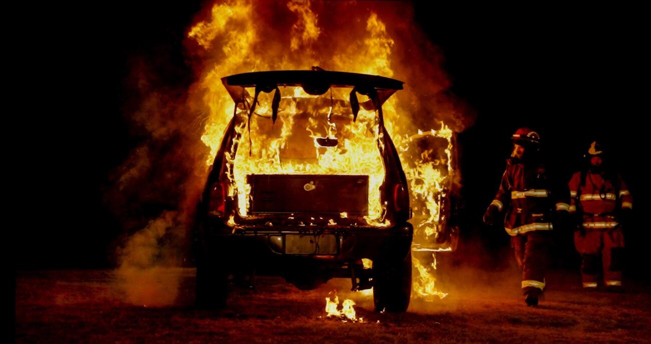 Durango burning with TruckVault installed firefighters approaching