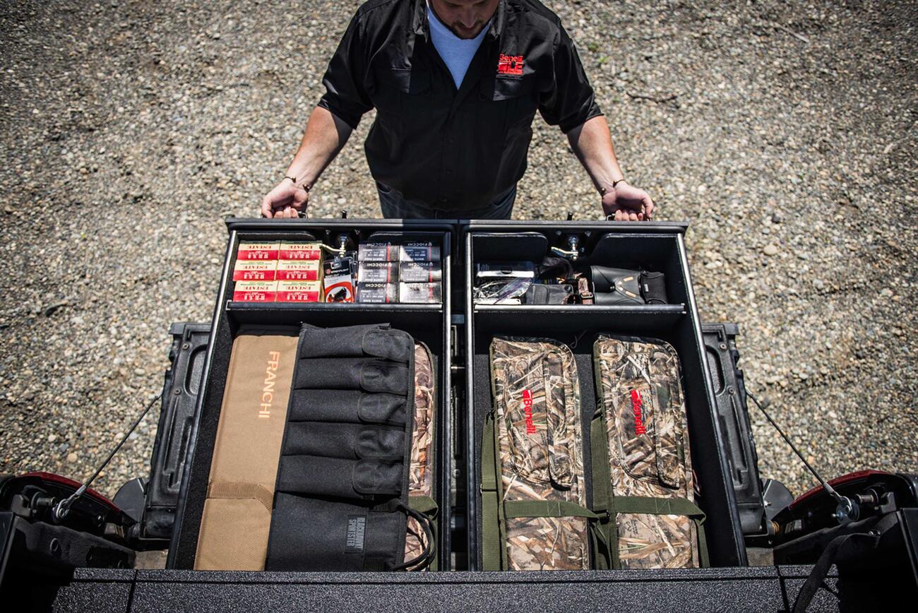 A Ford F-350 with bed storage for Benelli guns, ammo, and equipment.