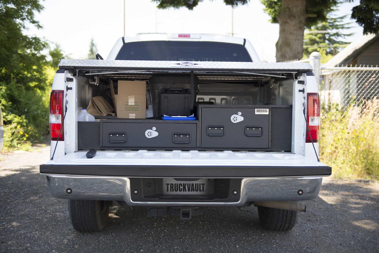 PickupSeries_CoveredBedLine_Custom_2008_Ford_F150_UScustoms2.jpg A White Ford F-150 with a covered bed and offset TruckVault drawers.