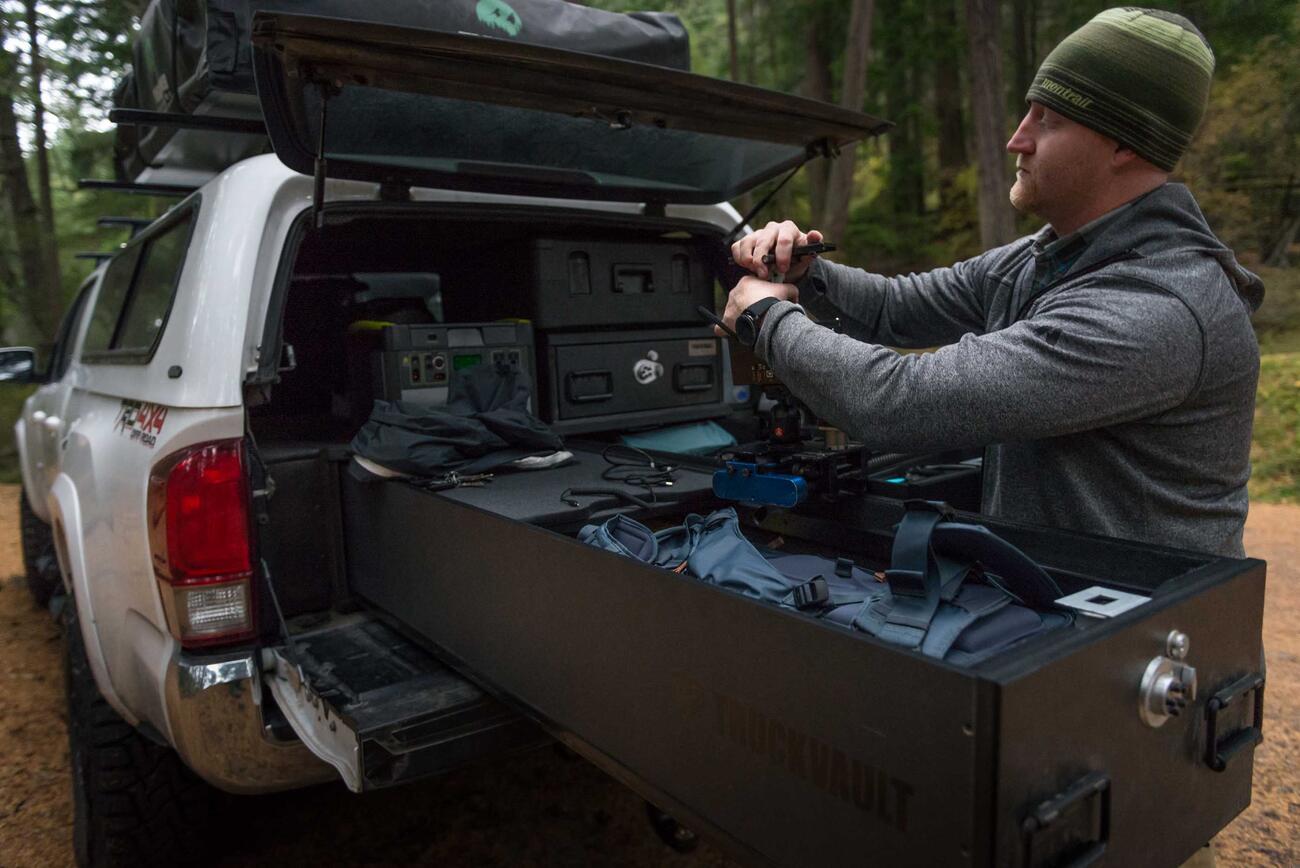 PickupSeries_CoveredBedLine_Custom_2016_Toyota_Tacoma_AndyBest-16.jpg Andy Best taking his camera gear out of a TruckVault in the back of his Toyota Tacoma.