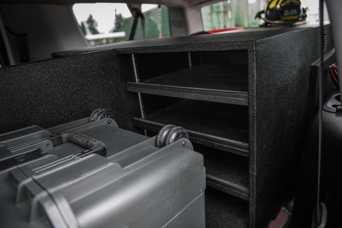 Fire/EMS The inside of a fire department Chevy Suburban with a custom TruckVault and Pelican case.