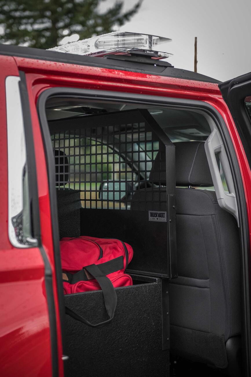 A custom TruckVault in the back of a fire department Chevy Suburban.