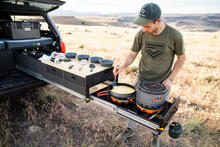 Man cooking off TruckVault Base Camp 1