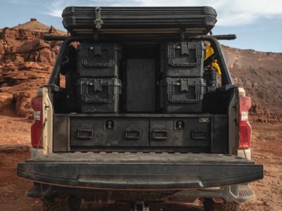 2023 Chevrolet Silverado 1500 All-Weather Offset TruckVault Drawers Rear Direct View with boxes stacked on top of the vault.