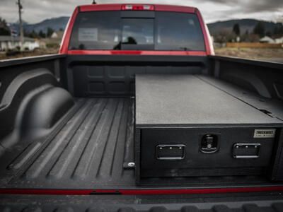 half with all weather TruckVault secure truck bed storage system in Dodge Ram