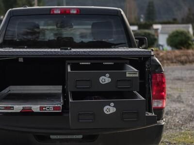 pickup truck with half width drawers stacked on passenger side and cargo glide on driver side