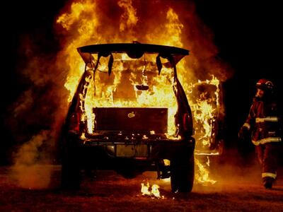 Durango burning with TruckVault installed firefighters approaching
