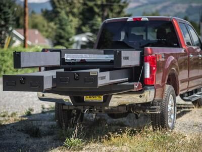 A Ford F250 with a custom 2 drawer TruckVault used for everyday gun storage.