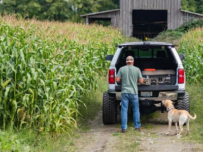 Dog and owner getting ready for a walk.